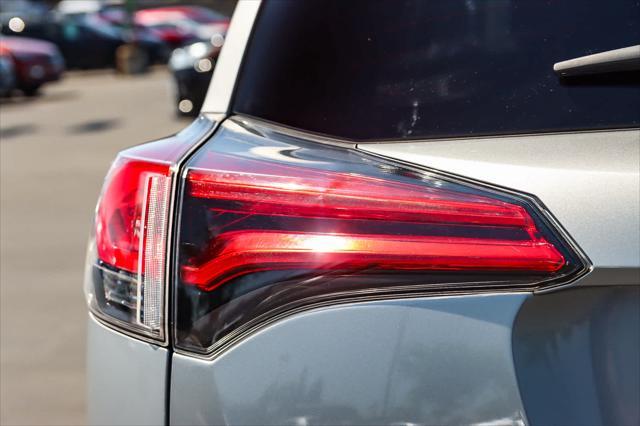 used 2018 Toyota RAV4 car, priced at $21,601