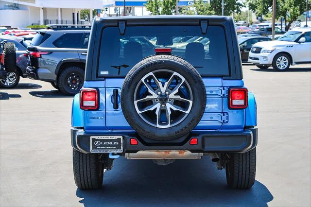 used 2024 Jeep Wrangler 4xe car, priced at $32,591