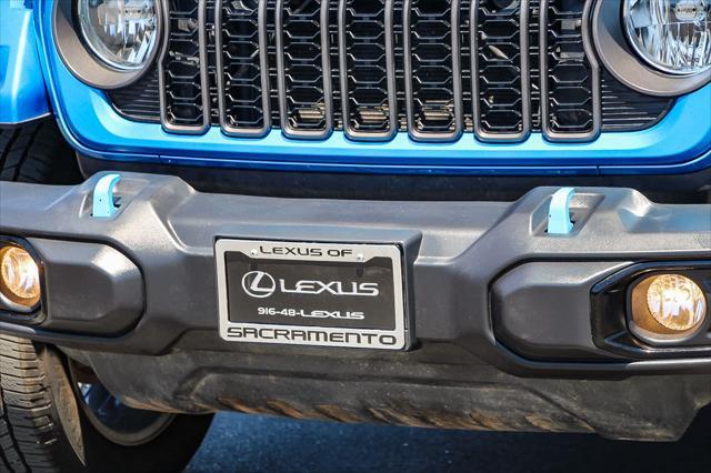used 2024 Jeep Wrangler 4xe car, priced at $32,591