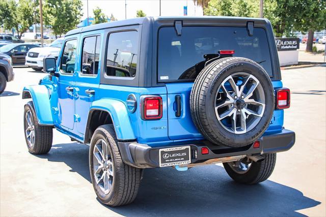 used 2024 Jeep Wrangler 4xe car, priced at $32,591