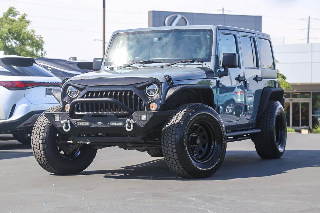 used 2015 Jeep Wrangler Unlimited car, priced at $17,543