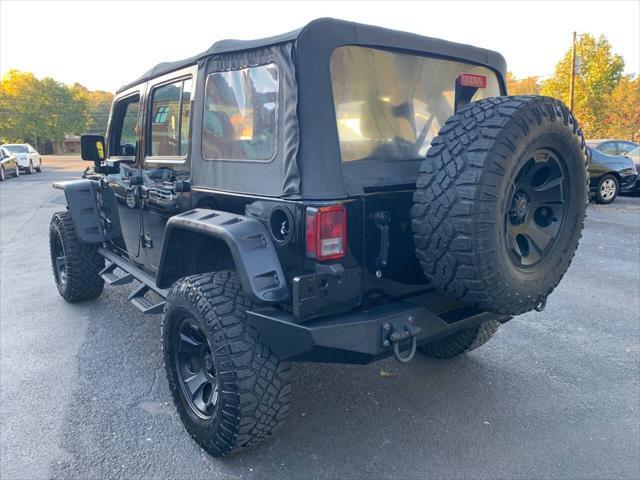 used 2015 Jeep Wrangler Unlimited car, priced at $16,995