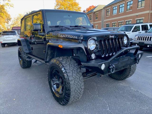 used 2015 Jeep Wrangler Unlimited car, priced at $16,995