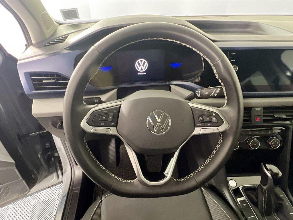 used 2023 Volkswagen Taos car, priced at $24,000