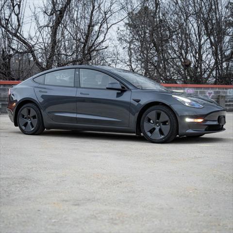 used 2023 Tesla Model 3 car, priced at $27,500