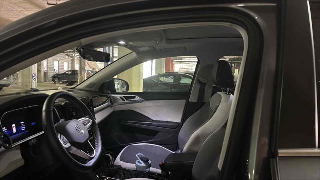 used 2025 Volkswagen Taos car, priced at $29,500