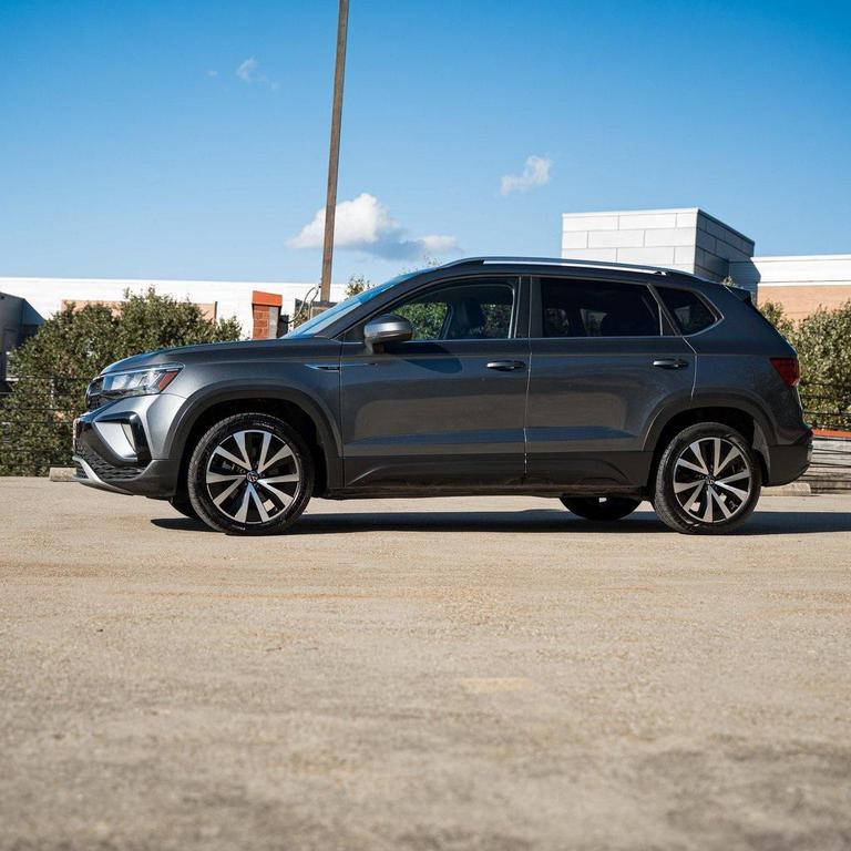 used 2023 Volkswagen Taos car, priced at $18,500