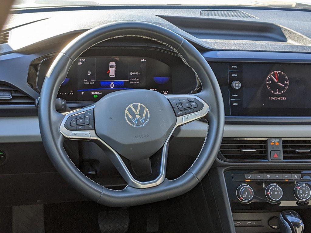 used 2023 Volkswagen Taos car, priced at $18,500