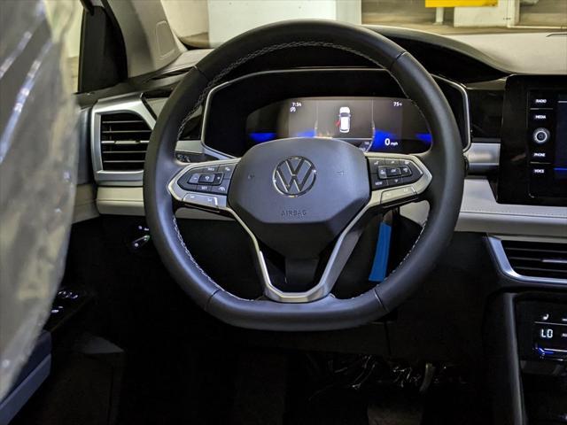 new 2025 Volkswagen Taos car, priced at $28,411