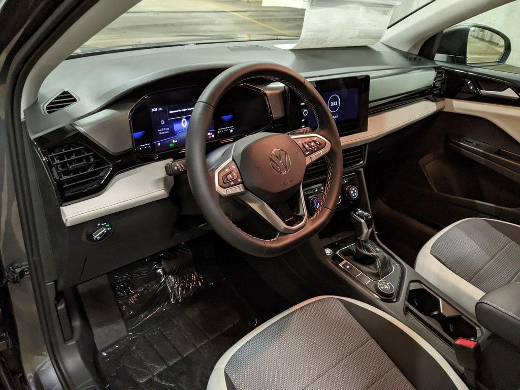 new 2025 Volkswagen Taos car, priced at $25,711