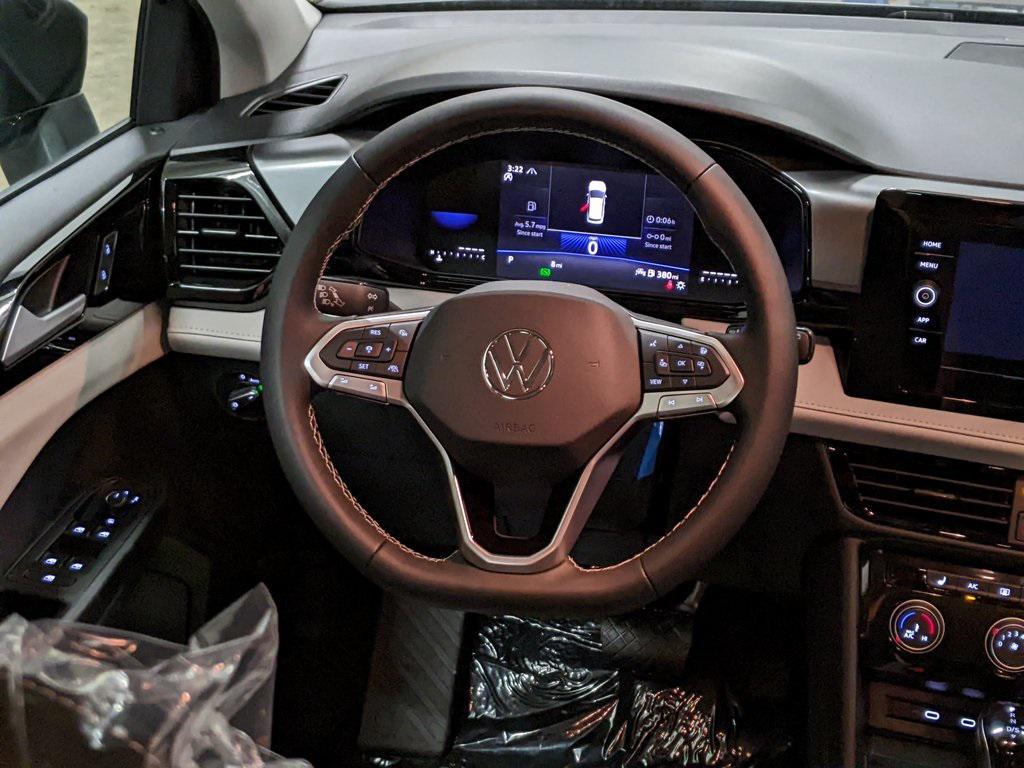 new 2025 Volkswagen Taos car, priced at $25,711