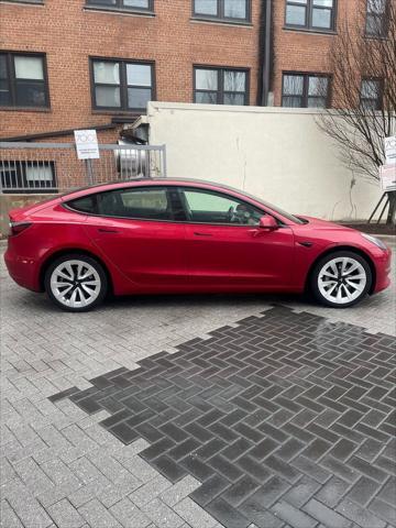 used 2022 Tesla Model 3 car, priced at $27,000