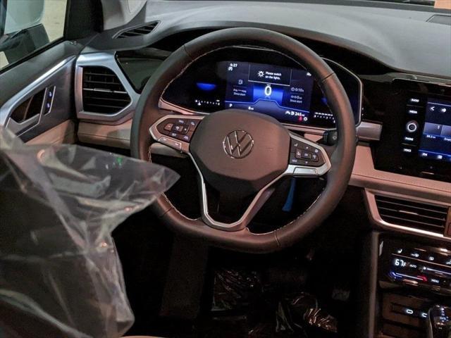 new 2025 Volkswagen Taos car, priced at $29,716