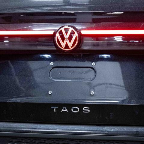 new 2025 Volkswagen Taos car, priced at $27,011