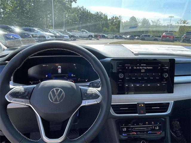 new 2025 Volkswagen Taos car, priced at $28,233