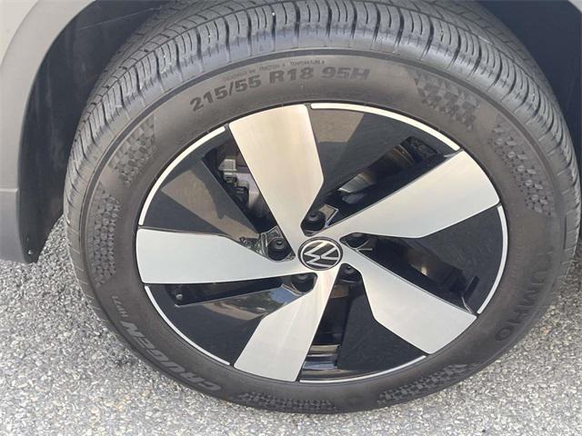 used 2024 Volkswagen Taos car, priced at $23,457