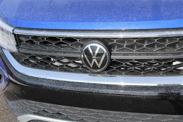 new 2024 Volkswagen Taos car, priced at $26,844