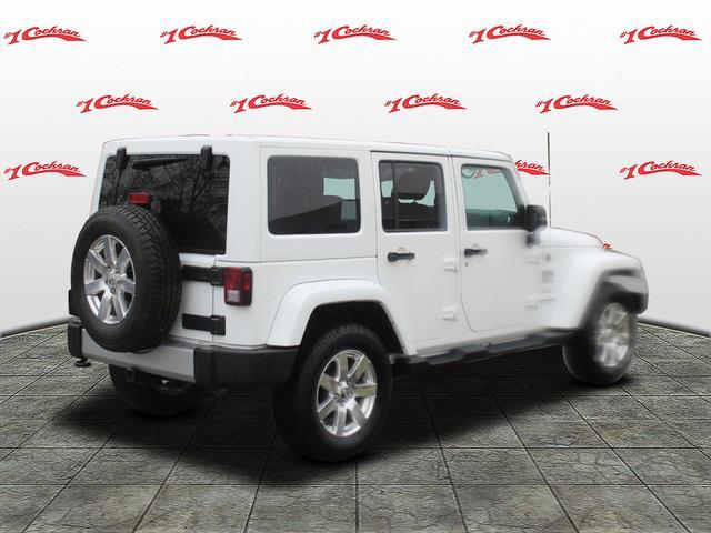 used 2018 Jeep Wrangler JK Unlimited car, priced at $24,494