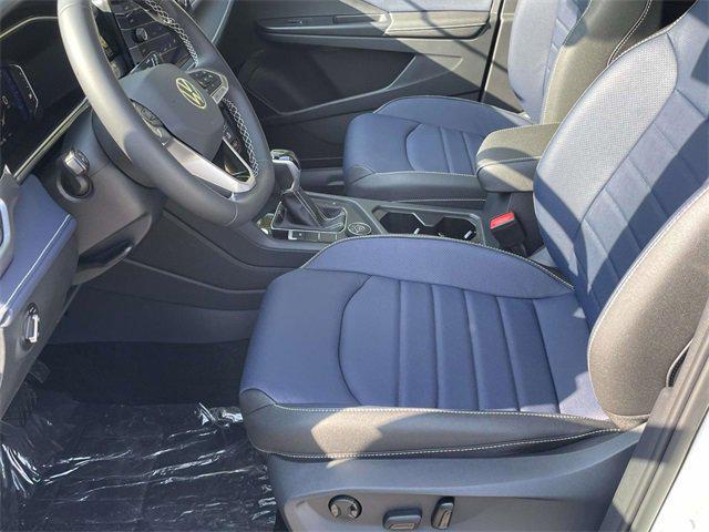 new 2025 Volkswagen Taos car, priced at $33,298
