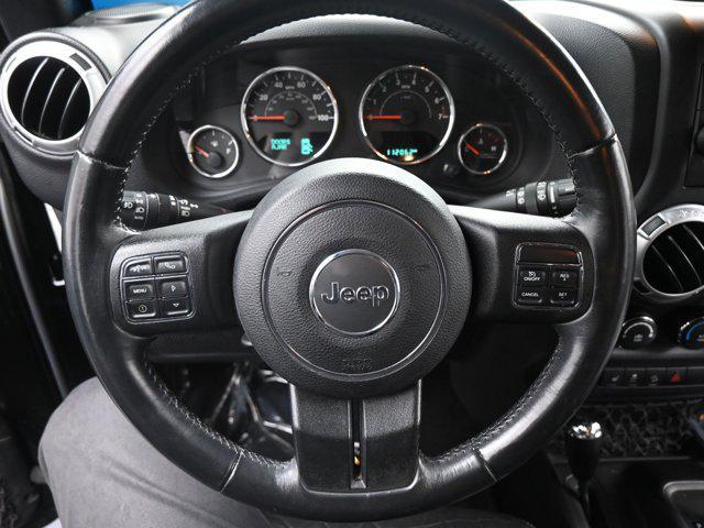 used 2015 Jeep Wrangler Unlimited car, priced at $21,977