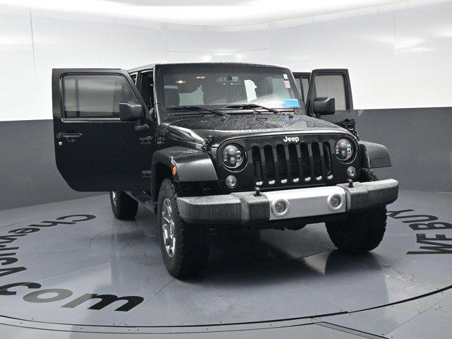 used 2015 Jeep Wrangler Unlimited car, priced at $21,977
