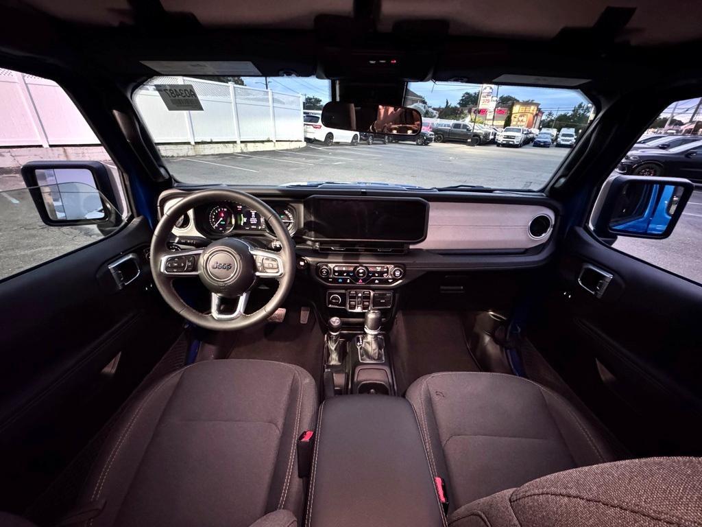 used 2024 Jeep Wrangler 4xe car, priced at $32,850