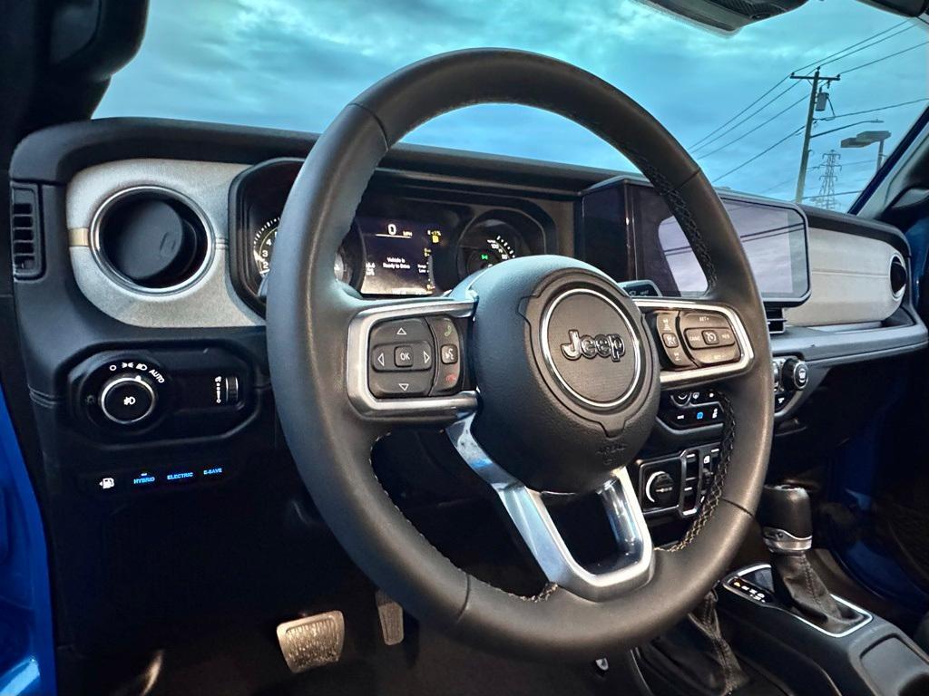 used 2024 Jeep Wrangler 4xe car, priced at $32,850