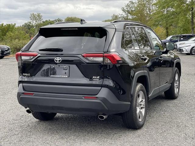 used 2023 Toyota RAV4 car, priced at $30,587