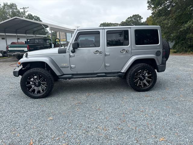 used 2014 Jeep Wrangler Unlimited car, priced at $23,995