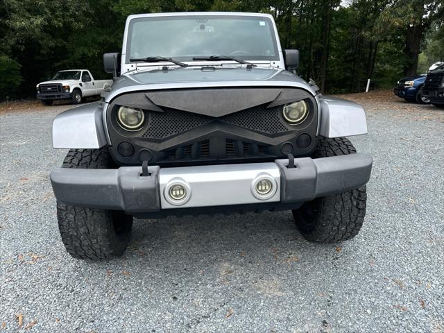 used 2014 Jeep Wrangler Unlimited car, priced at $23,995