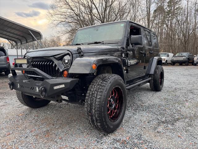 used 2012 Jeep Wrangler Unlimited car, priced at $18,995