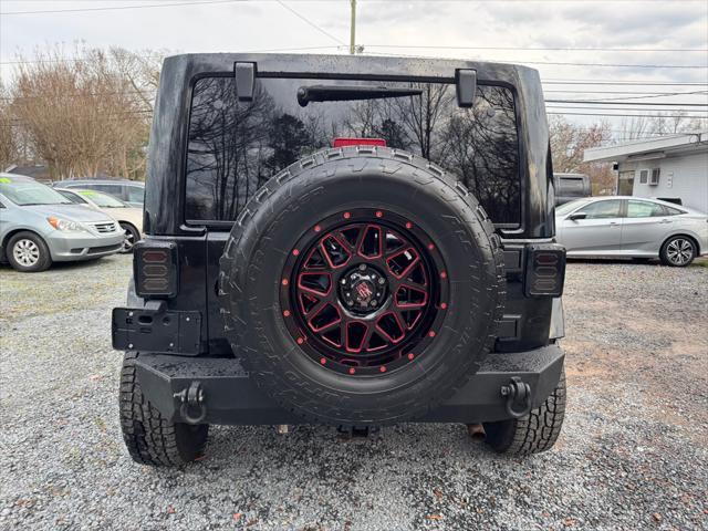 used 2012 Jeep Wrangler Unlimited car, priced at $18,995