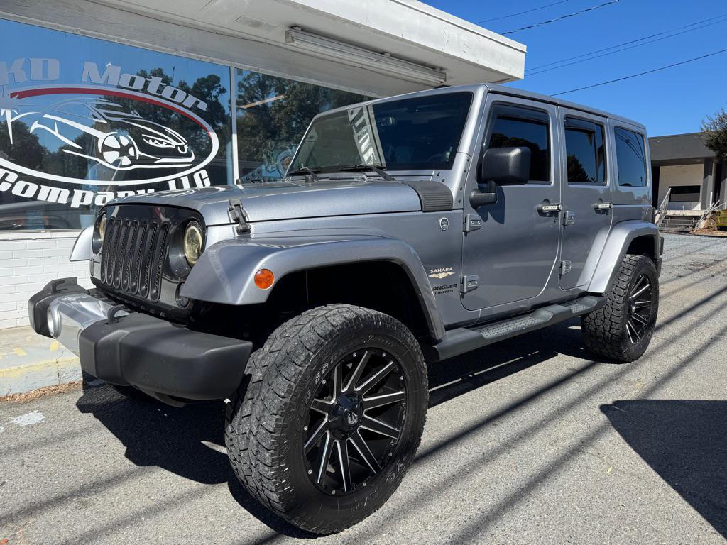 used 2014 Jeep Wrangler Unlimited car, priced at $18,995