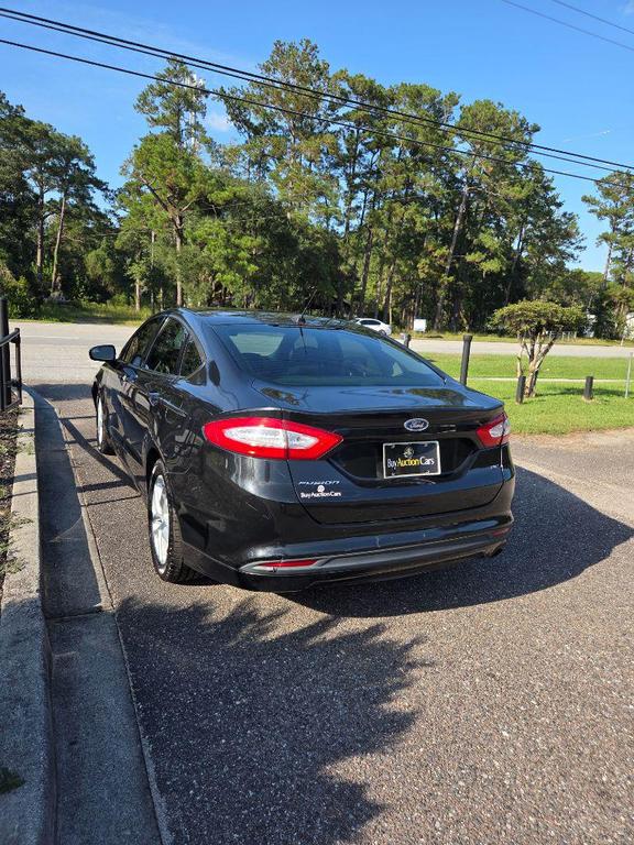 used 2014 Ford Fusion car, priced at $2,500