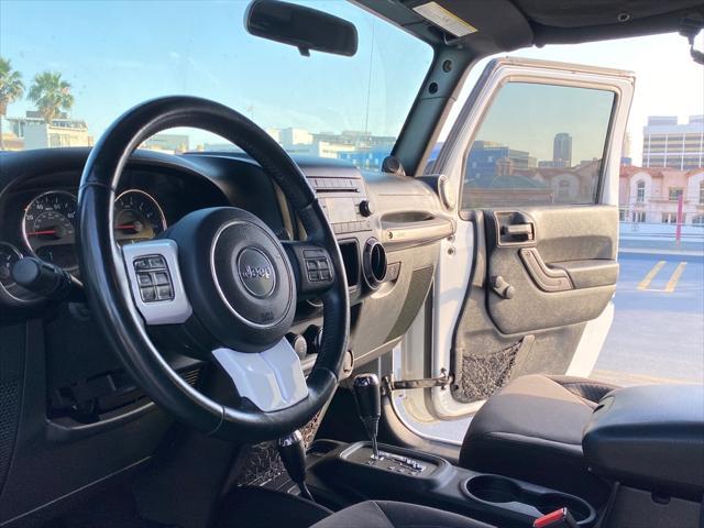 used 2014 Jeep Wrangler Unlimited car, priced at $13,999