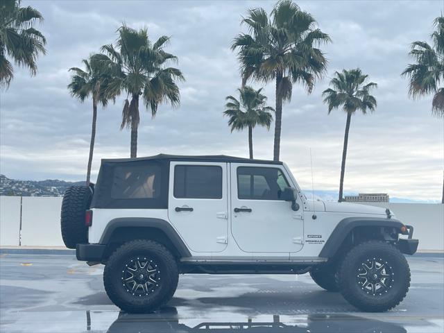 used 2014 Jeep Wrangler Unlimited car, priced at $14,777