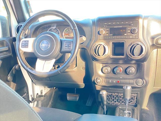 used 2014 Jeep Wrangler Unlimited car, priced at $13,999