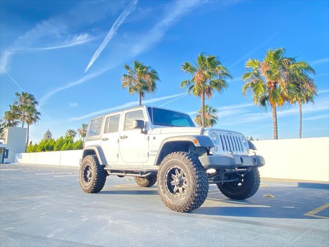 used 2014 Jeep Wrangler Unlimited car, priced at $13,999