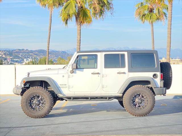 used 2014 Jeep Wrangler Unlimited car, priced at $13,999