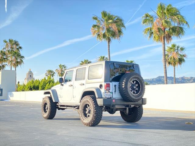 used 2014 Jeep Wrangler Unlimited car, priced at $13,999