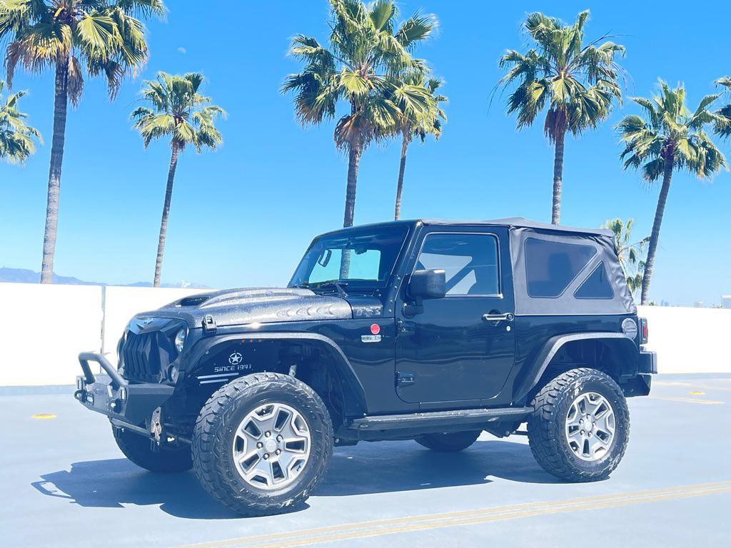 used 2014 Jeep Wrangler car, priced at $11,999