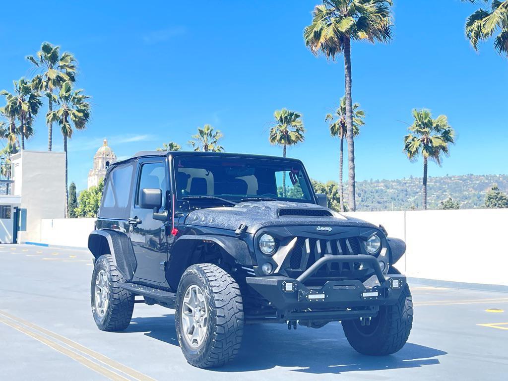 used 2014 Jeep Wrangler car, priced at $11,999