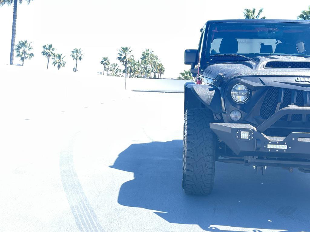used 2014 Jeep Wrangler car, priced at $11,999