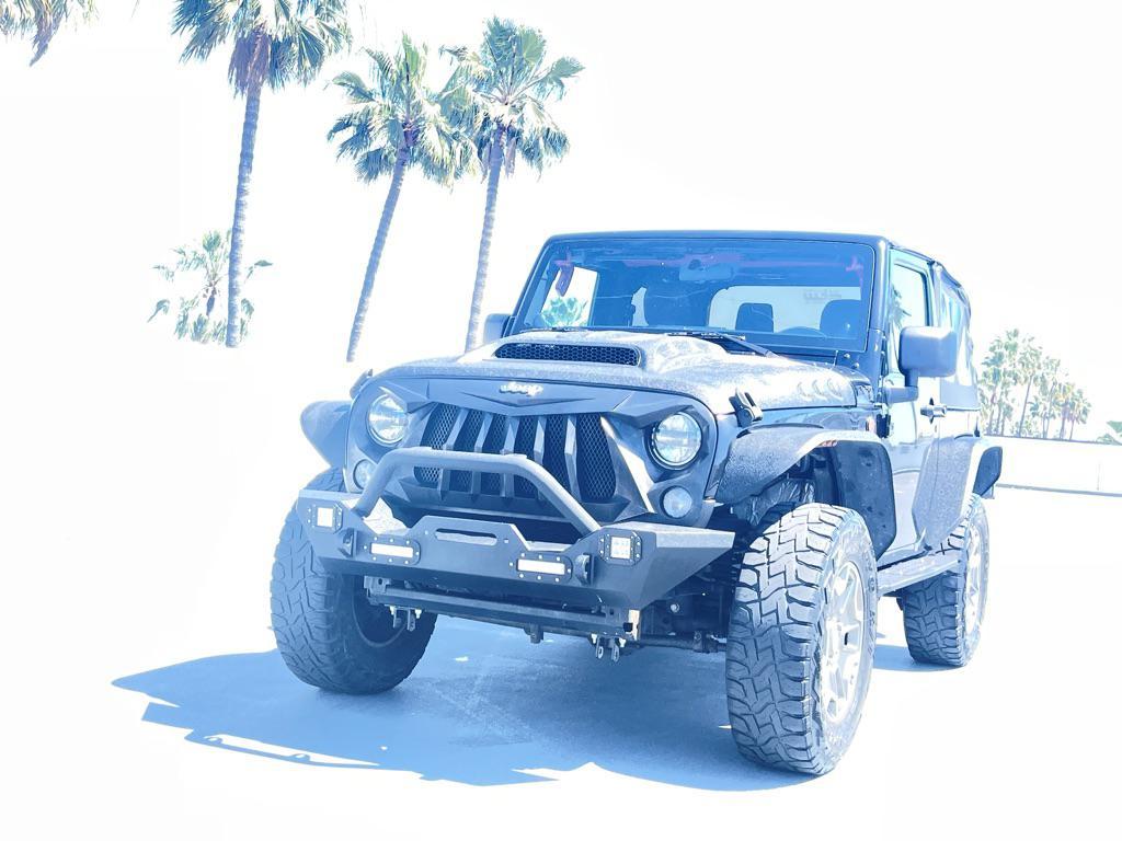 used 2014 Jeep Wrangler car, priced at $11,999