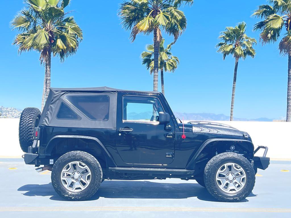 used 2014 Jeep Wrangler car, priced at $11,999