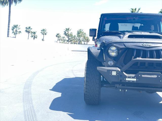 used 2014 Jeep Wrangler car, priced at $14,999