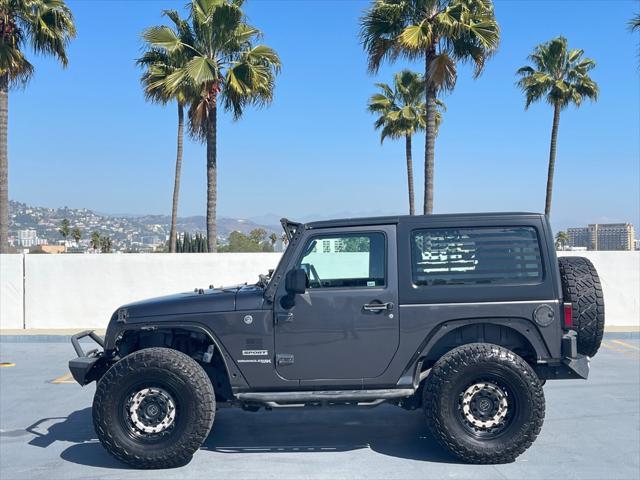 used 2018 Jeep Wrangler JK car, priced at $14,999