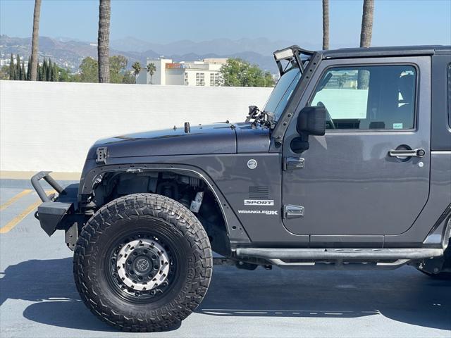 used 2018 Jeep Wrangler JK car, priced at $14,999