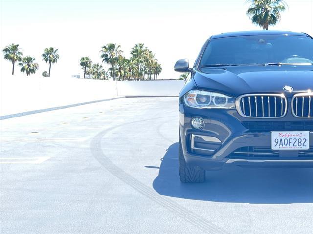 used 2018 BMW X6 car, priced at $23,999