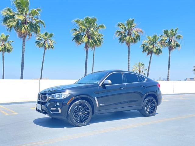 used 2018 BMW X6 car, priced at $23,999